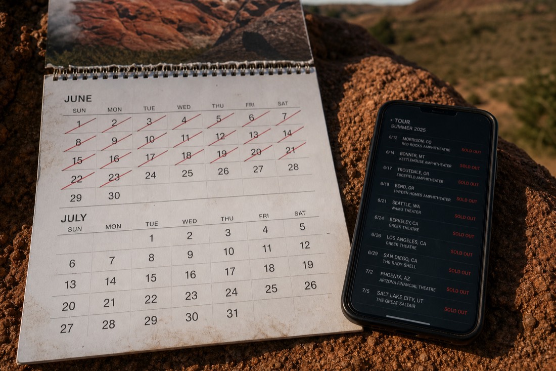 Calendar page with summer dates crossed out beside a phone showing sold-out tour times